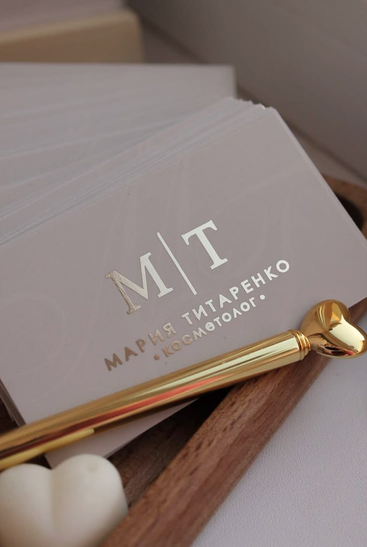 Custom silver foil business cards supporting creative branding and polished professional communication