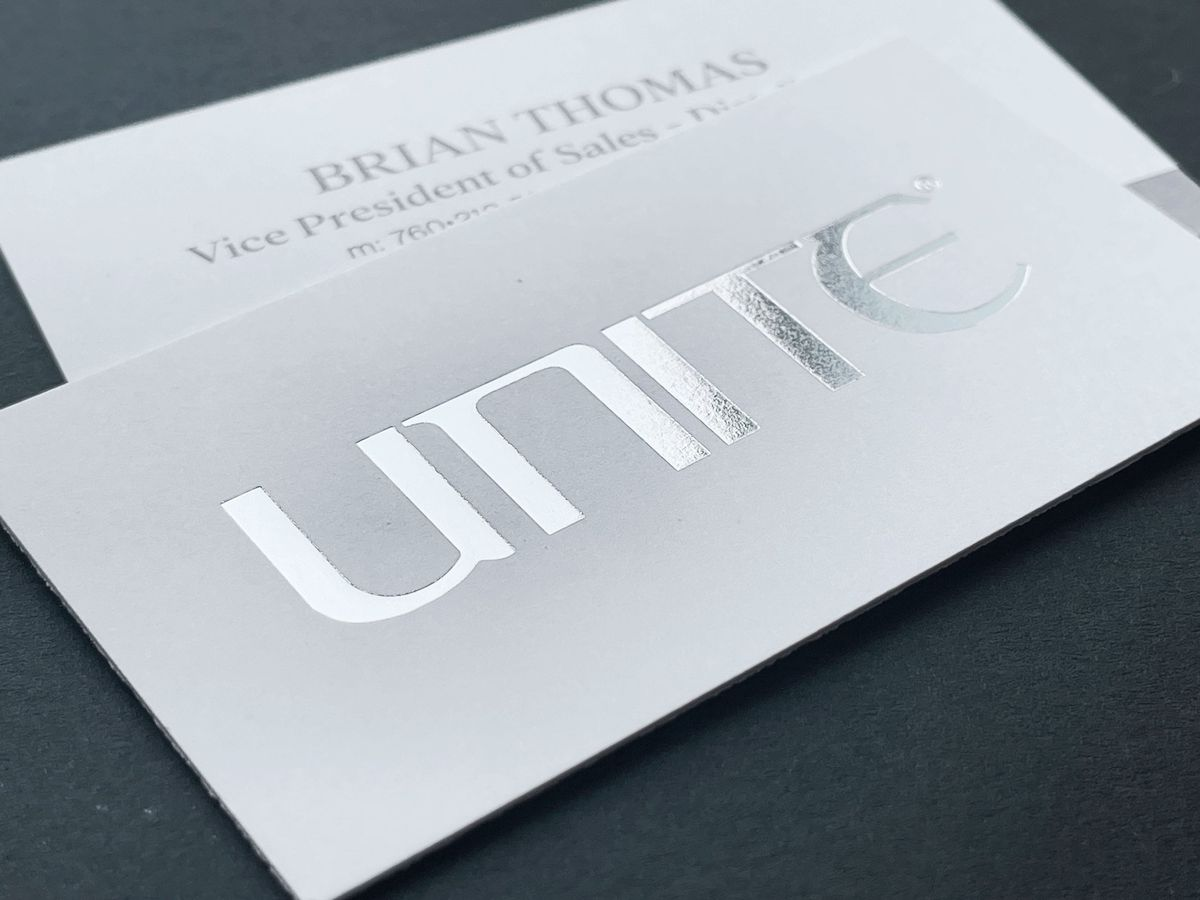 Premium silver foil visiting card design with a sophisticated metallic finish for professional branding